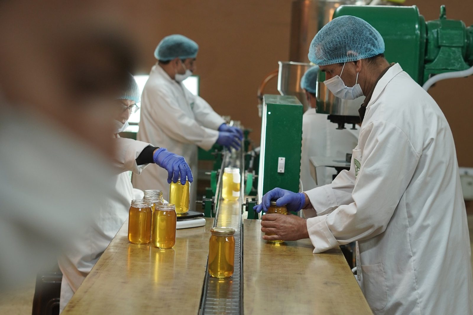Honey bottling & packing line in the factory wing